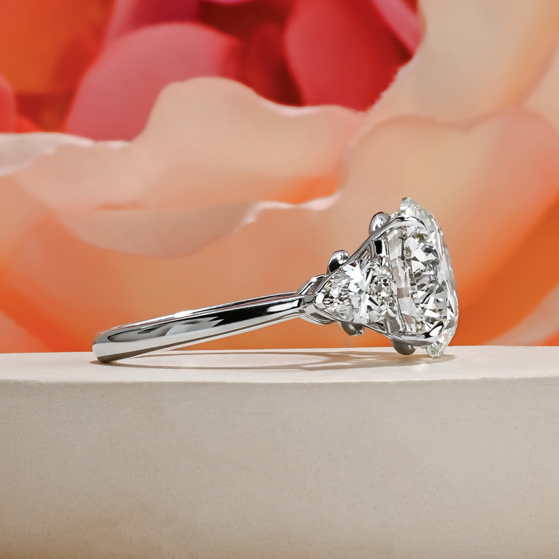 8-1/2ctw Round & Pear Three Stone