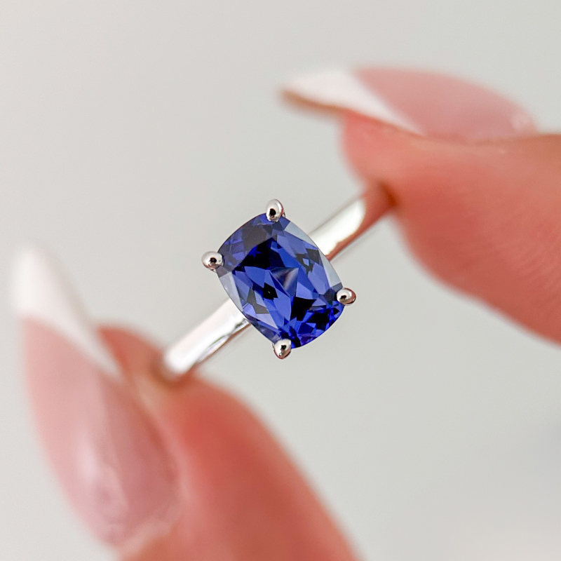 Custom White Gold Summit Hidden & Antique Cushion Sapphire Center