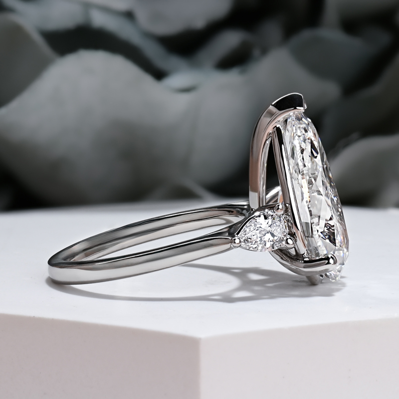 Grand 6ct Pear Three Stone