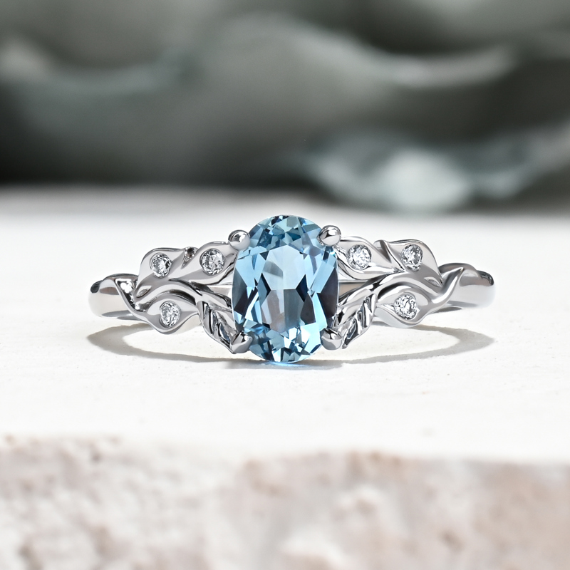 Leaf Design Twist Sky Blue Sapphire Ring