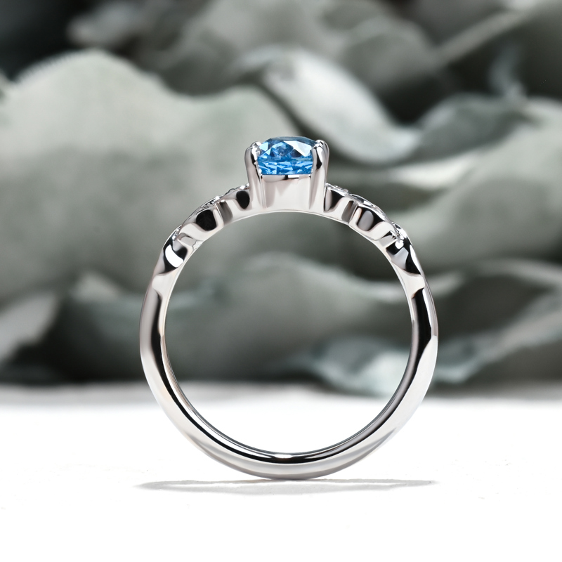 Leaf Design Twist Sky Blue Sapphire Ring
