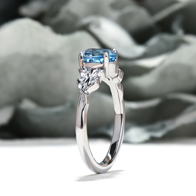 Leaf Design Twist Sky Blue Sapphire Ring