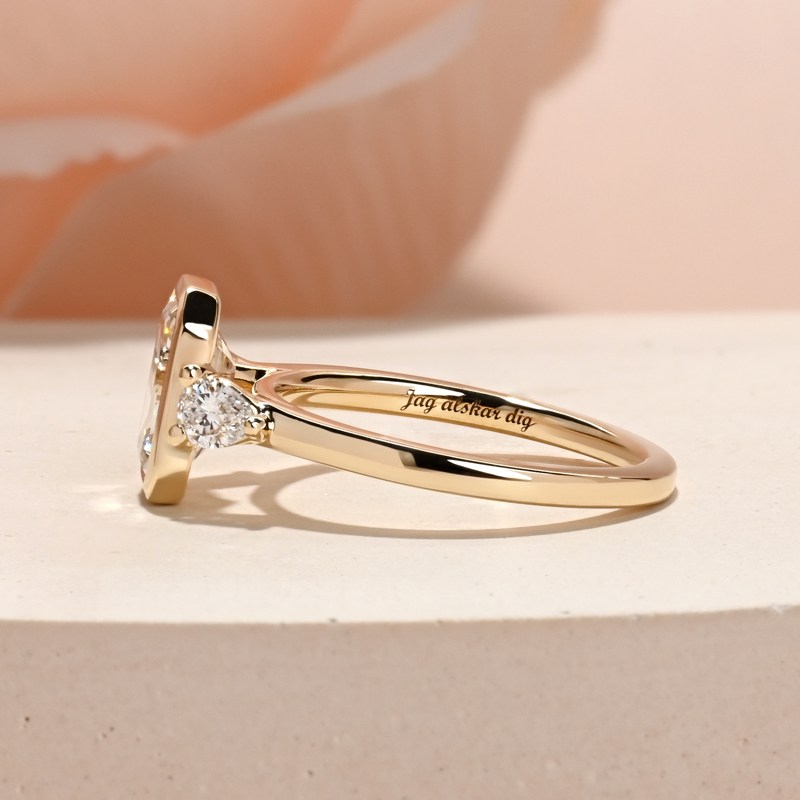 Modern Bezel Three Stone Emerald & Pear