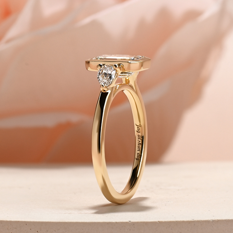 Modern Bezel Three Stone Emerald & Pear